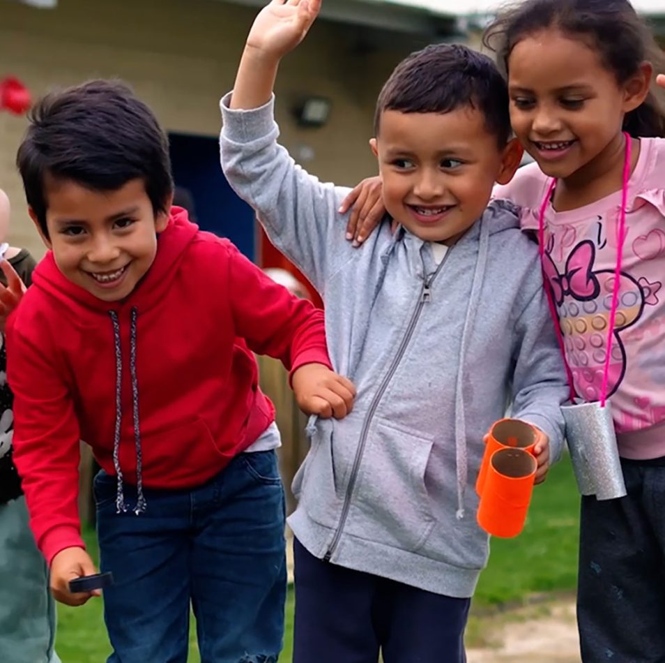 Happy children playing - 2 boys, three girls
